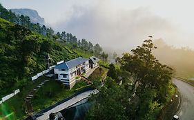 Misty Courtyard Munnar